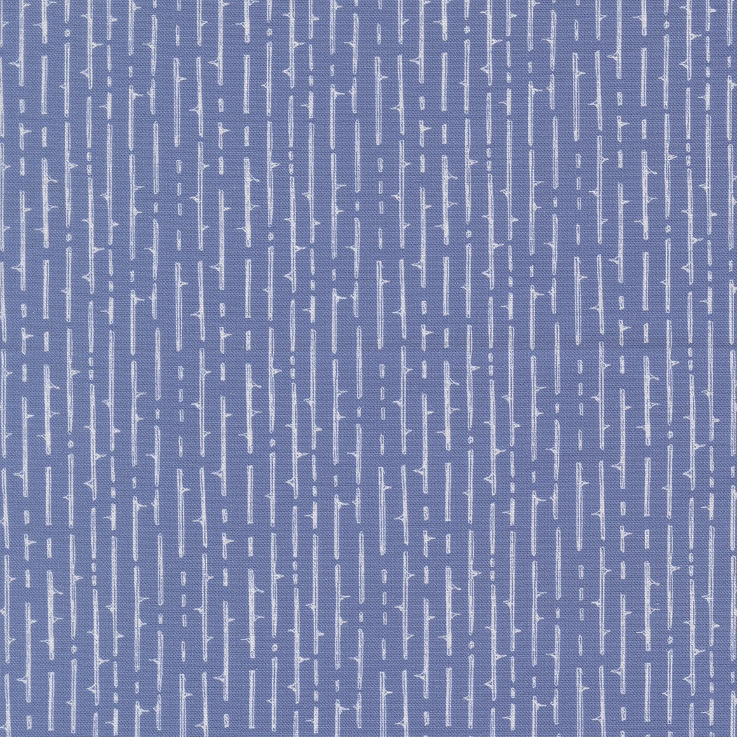 Close-up of Thorny Stripes Dusk quilting fabric by Robin Pickens for Moda Fabrics, featuring irregular cream vertical thorn-like stripes on a dusky periwinkle-blue cotton ground, SKU 48806-14