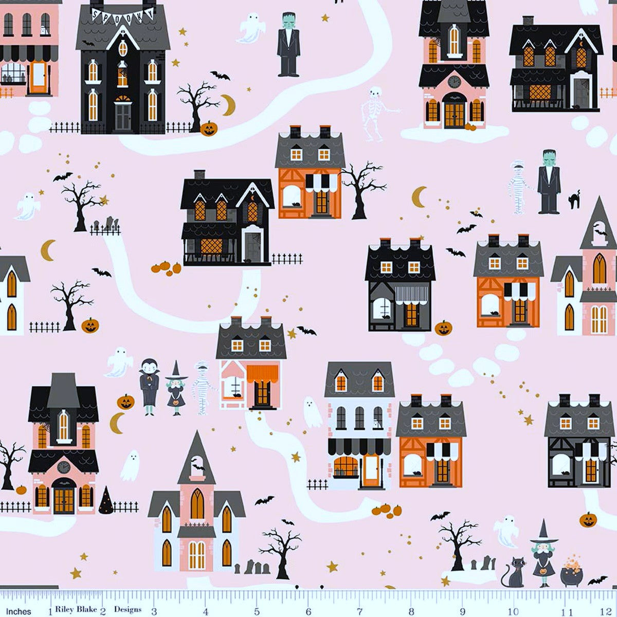Halloween-themed fabric with houses, ghosts, and pumpkins on a pink background.