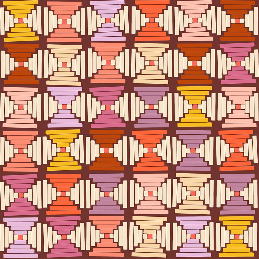 Cranberry fabric with geometric stacked trapezoid pattern in warm shades of pink, orange, yellow, and cream.