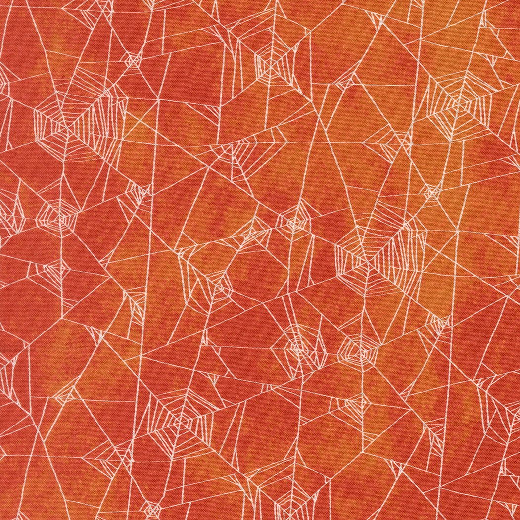 A repeating Halloween-style pattern of white spiderwebs over a textured orange background.