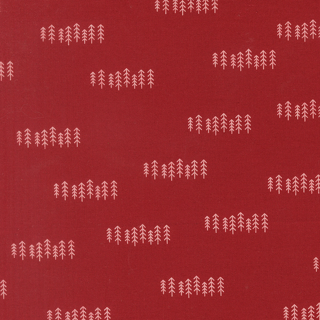 Pattern of white trees on a red background