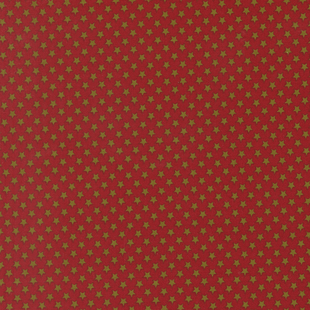 Red fabric with small olive green star pattern