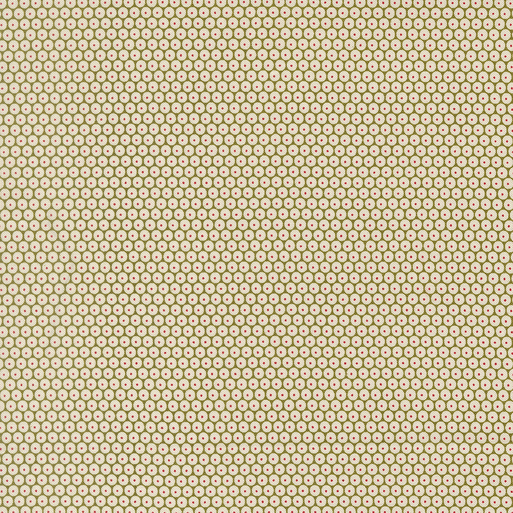 Patterned fabric swatch with small cream circles with red dot in the center on an olive green background.