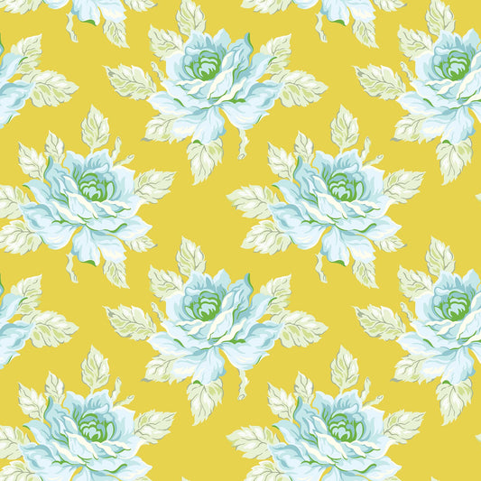 Golden yellow fabric with large blue and white roses and pale green leaves in a repeating floral pattern.