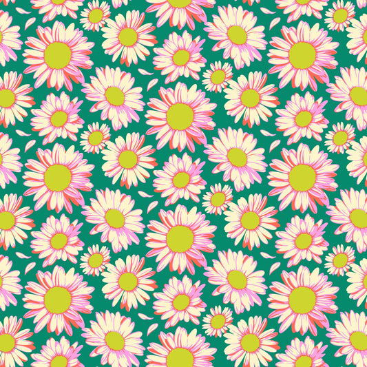 Dark teal fabric with overlapping daisies in cream, pink, and yellow tones with scattered petals in a cheerful repeating pattern.