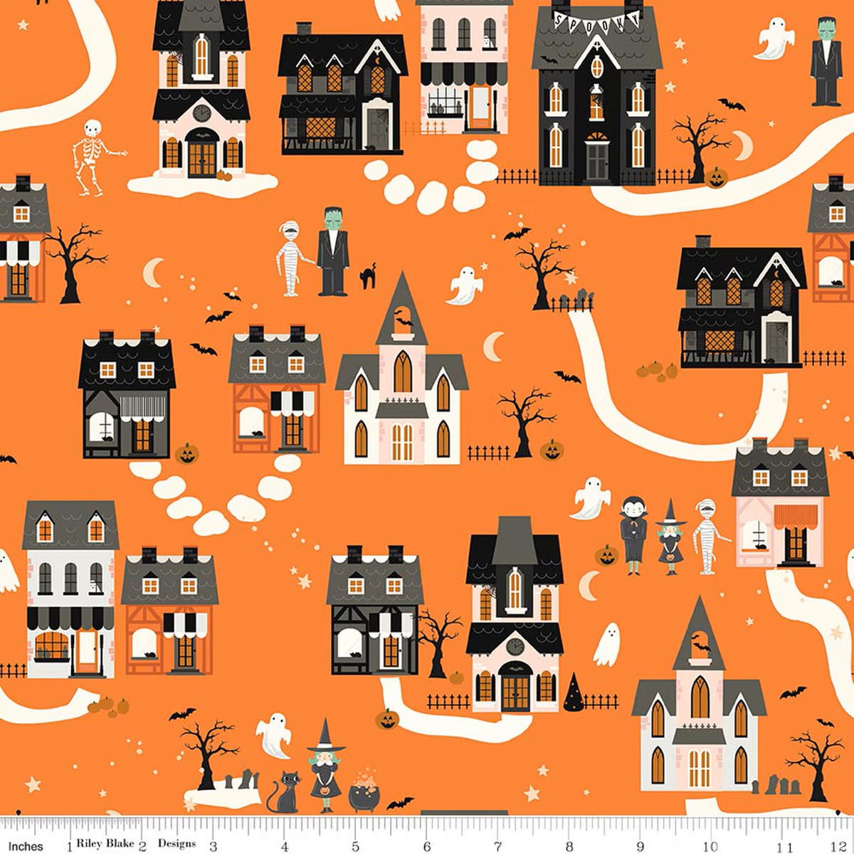 Halloween-themed fabric with houses, ghosts, and skeletons on an orange background.