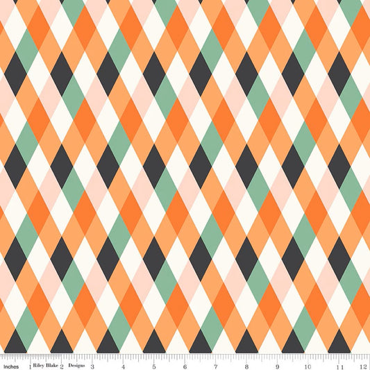 Patterned fabric with a diamond design in orange, green, and black on a white background.