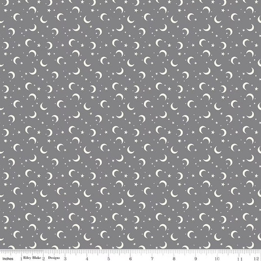 Pattern of white crescent moons and stars on a gray background