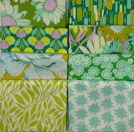Collection of green and white floral fabric swatches arranged in a grid.