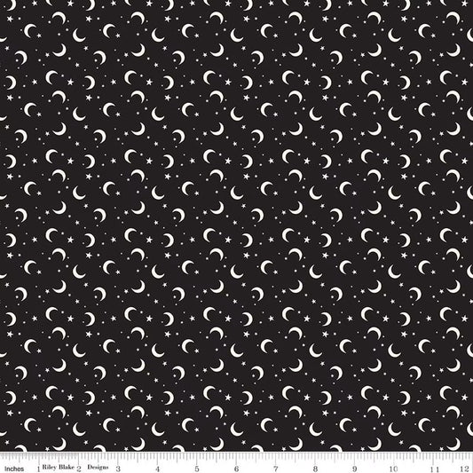 Pattern of white crescent moons and stars on a black background