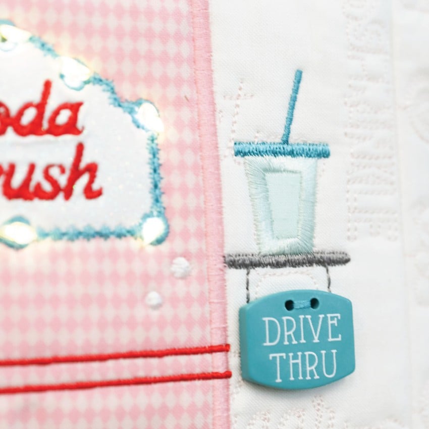 (Detail/contents): Additional embellishments from Kimberbell Sweetheart Street bench pillow kit showing coordinating trims