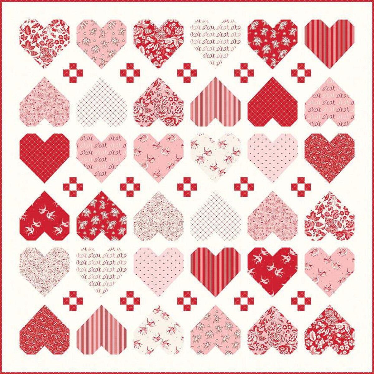 (Quilt detail/pattern): Letters to Cupid quilt pattern showing heartwarming Valentine design by Riley Blake Designs