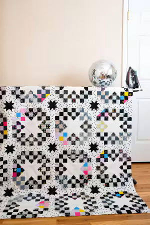 Disco Stars quilt pattern specifications and cutting instructions by Morgan McCollough showing scrap-friendly layout options

