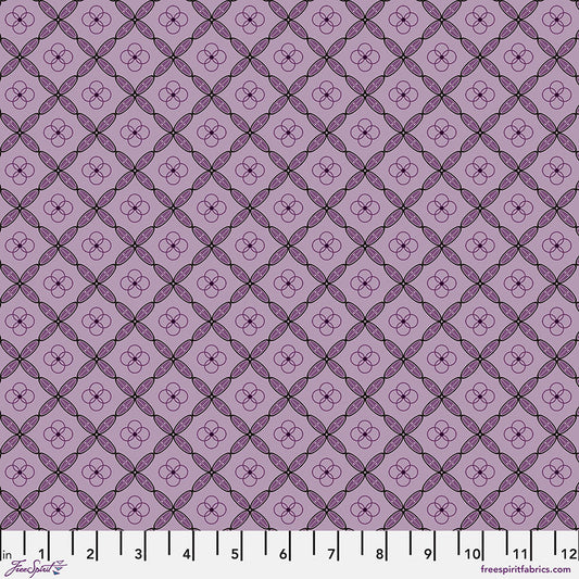 Enrapture Titles Amethyst quilting fabric by Giucy Giuce for FreeSpirit showing geometric tile pattern in purple amethyst tones