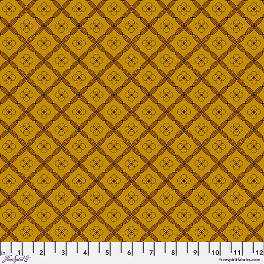 Enrapture Titles Carnelian quilting fabric by Giucy Giuce for FreeSpirit showing geometric tile pattern in warm orange carnelian tones