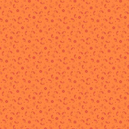 Patterned fabric with paisley and floral designs on an orange background