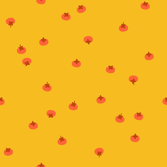 Golden yellow fabric with scattered orange persimmons featuring brown stems in a simple, playful pattern.