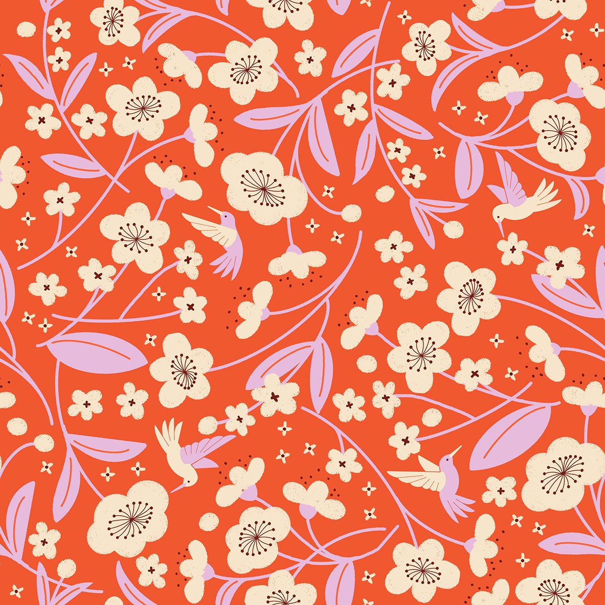 Warm red fabric with cream blossoms, lavender leaves, and hummingbirds in flight forming a lively floral pattern.