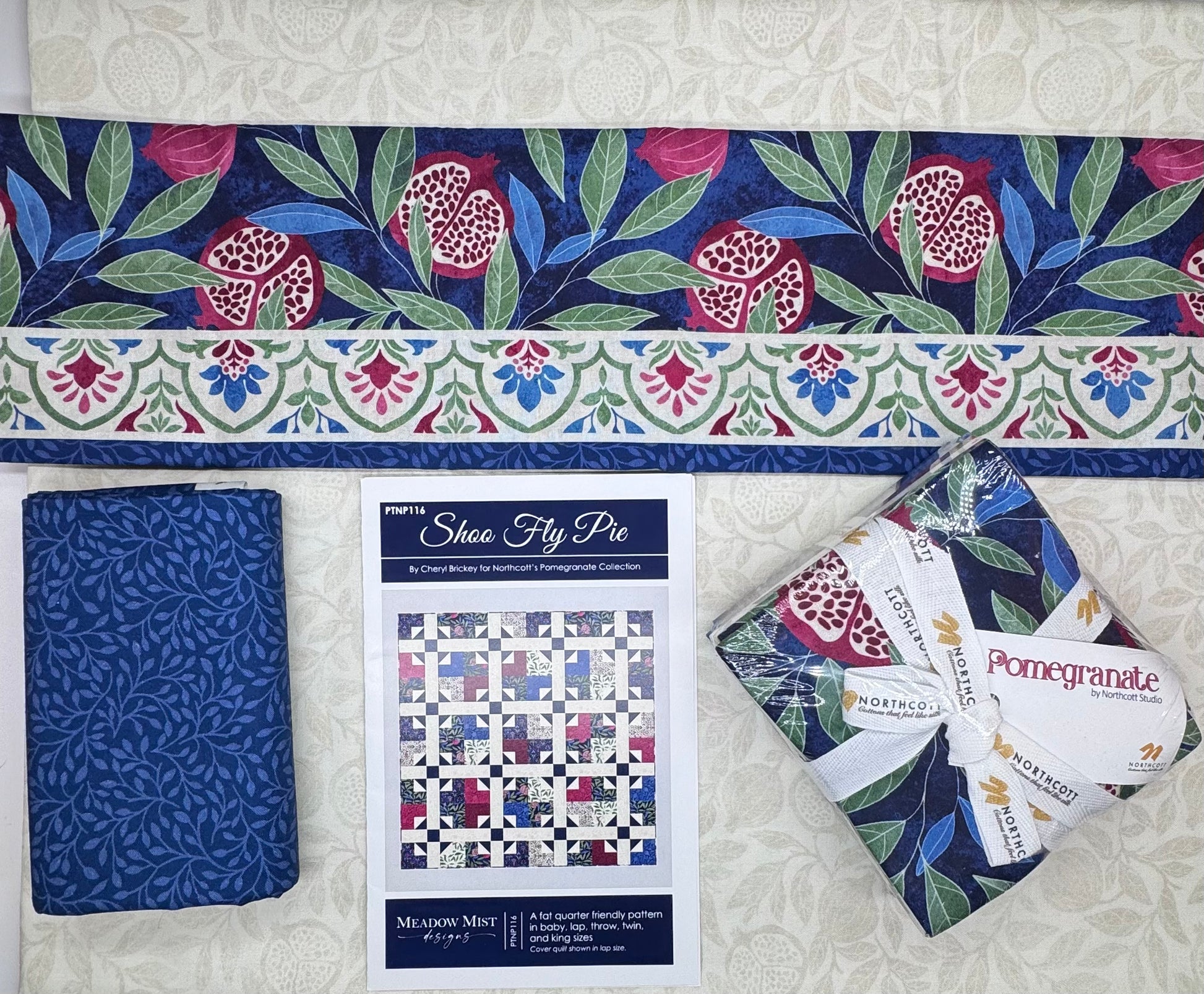 (Quilt kit): Shoo Fly Pie quilt kit in pomegranate colorway featuring traditional block pattern by Northcott Studios