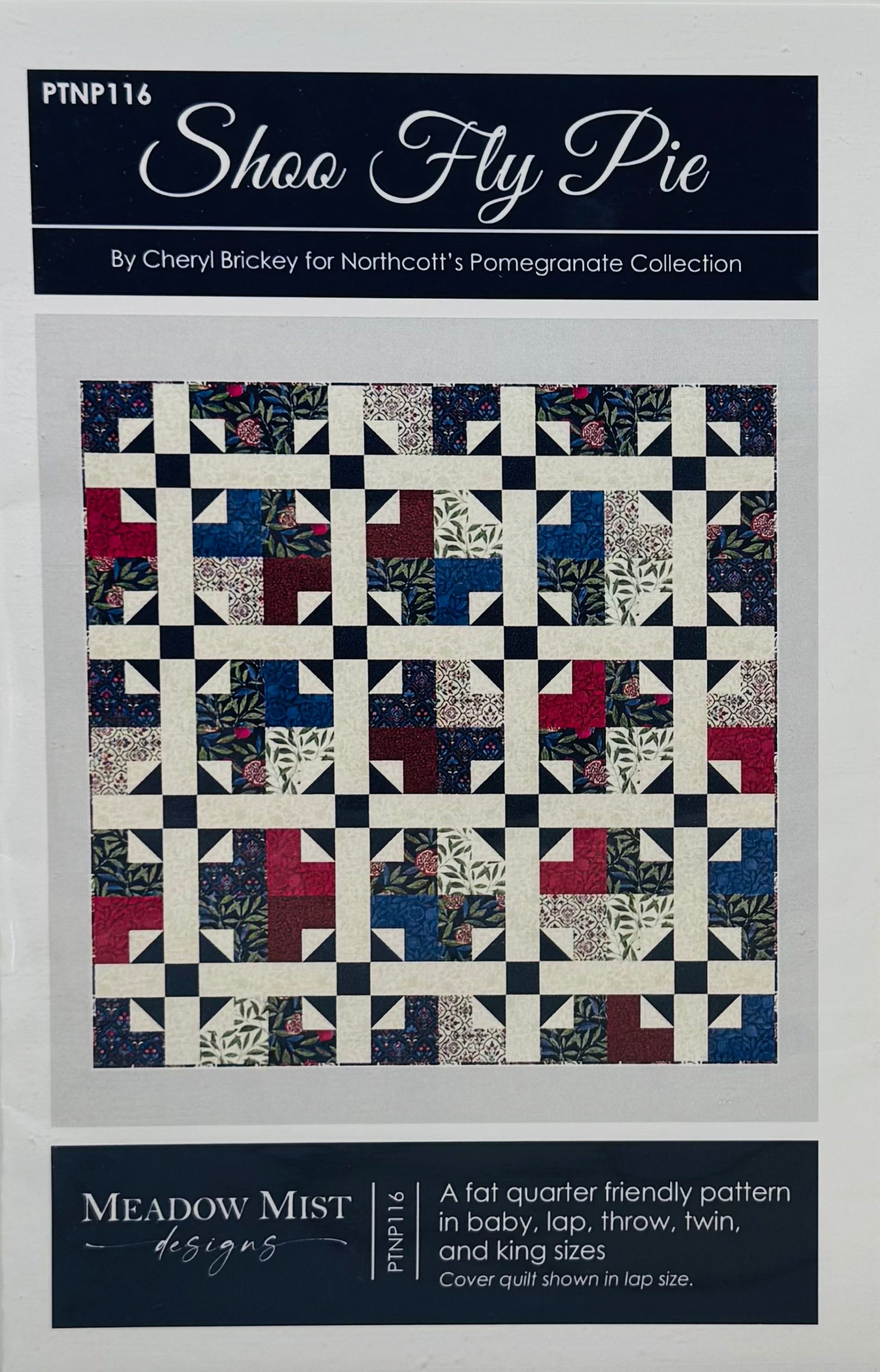 (Front view): Shoo Fly Pie quilt front view in pomegranate showing classic pieced block design by Northcott Studios