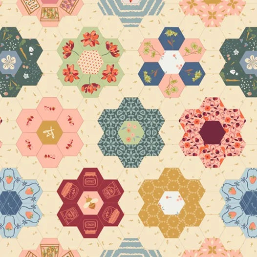 Hexagonal patchwork pattern with floral and geometric designs on a beige background