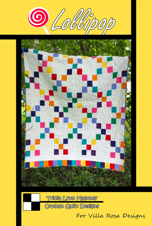 Lollipop quilt pattern 42 x 50 inches showing colorful squares and crosses in primary colors on white background with rainbow border
