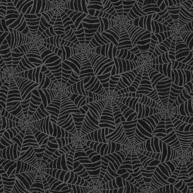 Pattern of spider webs on a black background